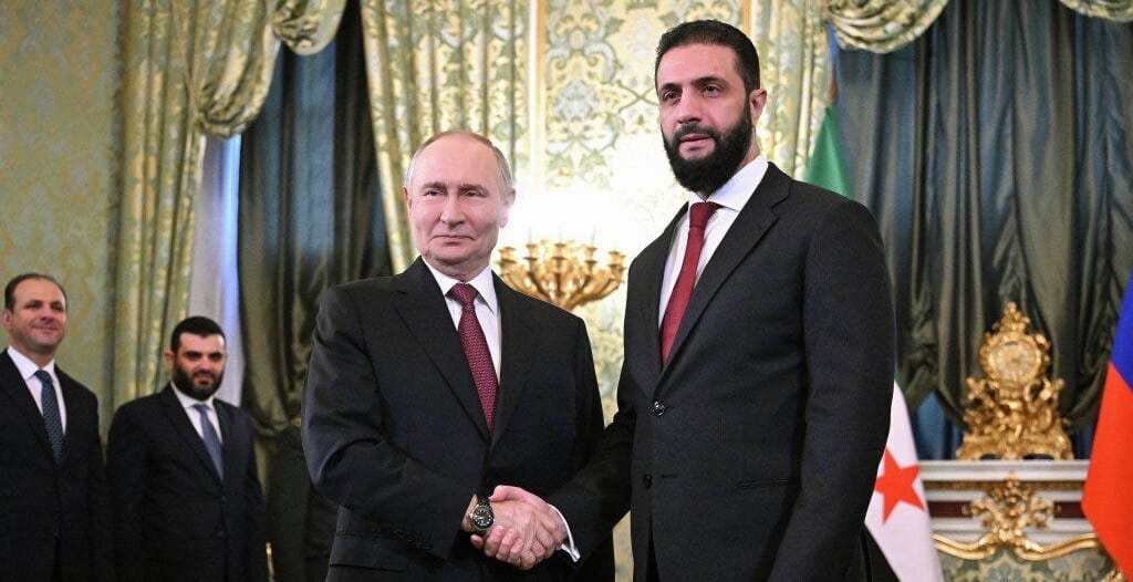 Vladimir Putin y Muhammad Al Jolani. Foto: Ria Novosti