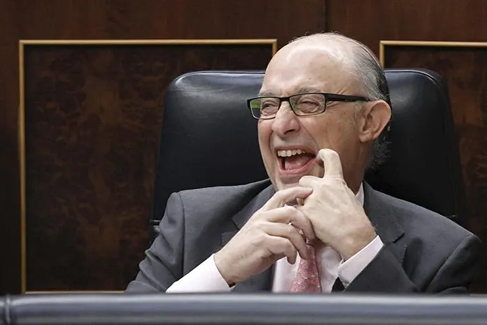 El exministro Montoro, imputado por corrupción en el Ministerio de Hacienda